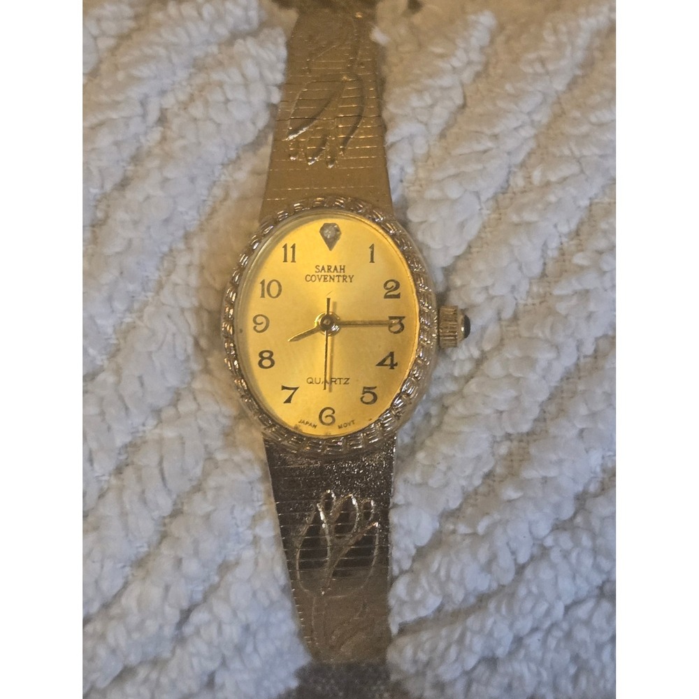 Sarah Coventry Vintage Gold Tone Floral Engraved Oval Face Quartz Watch